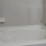 a bathroom with a bathtub and toilet