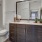 a bathroom with a tub sink and toilet