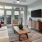 a living room with a tv and couches
