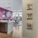 a kitchen with a pink wall