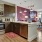 a kitchen with a wood floor