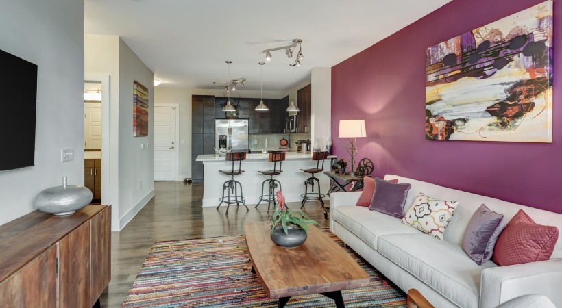 a living room with a couch and a table