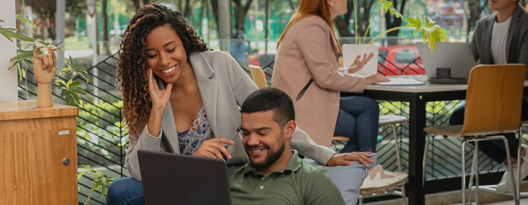 two people viewing computer screen