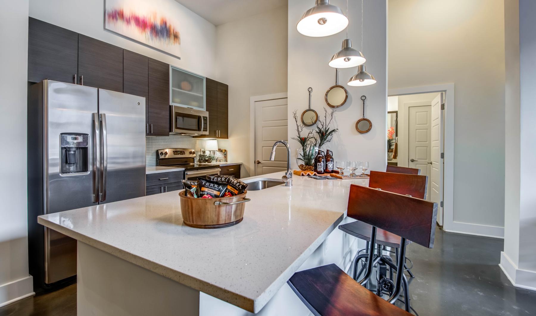 a kitchen with a table and chairs